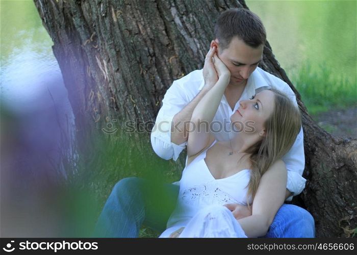 Portrait of love couple embracing outdoor