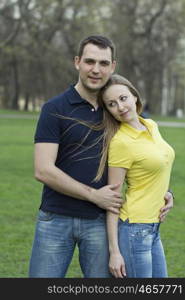 Portrait of love couple embracing outdoor