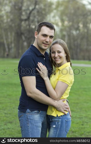 Portrait of love couple embracing outdoor