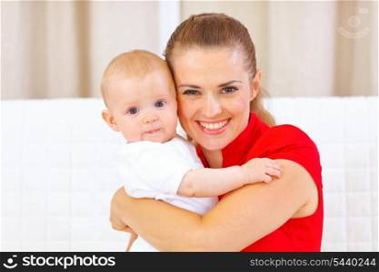 Portrait of lovely baby and young mother&#xA;