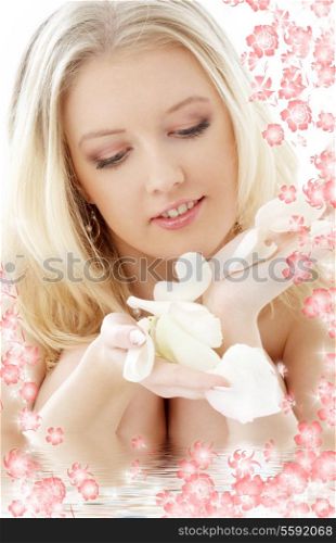 portrait of lovely blond with white rose petals and flowers in water