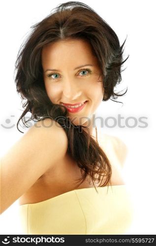 portrait of lovely brunette in yellow corset over white