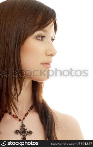 portrait of lovely brunette with cross over white
