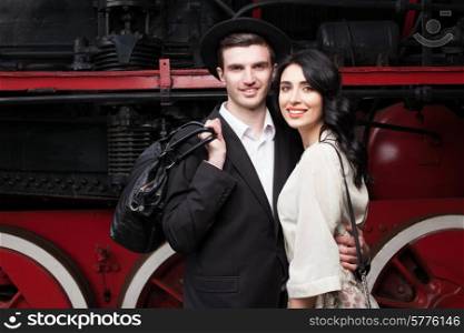 portrait of lovely couple on railway station