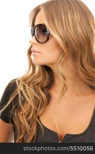 portrait of lovely woman in shades over white