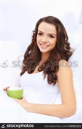 Portrait of lovely young woman having cup of tea at home. dp6pfFWPiVNN+fTY9gAFKSFCaOeCoLyOXPcZa5v6bAzr6SJK7s7GEm8pclvVJsU+E+nfKhZKDWpMwfd4jg7xj2g6OxppQLY/Vf/mJqKIKcyMZMzL/gRZ4iLBCdDZZRTENqDAPI+GsCnHOlokSkhHo/5gd7oAR6AOAudR41auoAw4qWh8wWnvjMEByeJsHV4O3RcYth4H9XfpNWUiBF+TV3jmKHggUyl5O6gCcfmXckYcBKQXbxTrXGSwtP945KtmzvmBvfNxL40=
