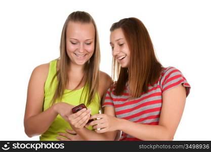 Portrait of lovely young women using mobile phone together isolated on white