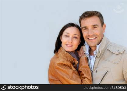 Portrait of loving couple with jackets on
