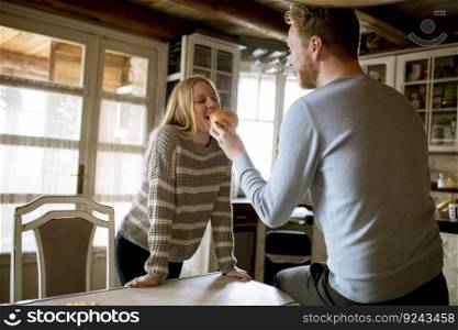 Portrait of loving young couple in the kitchen