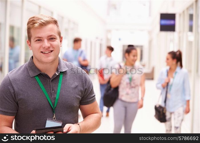 Portrait Of Male College Student In Hallway