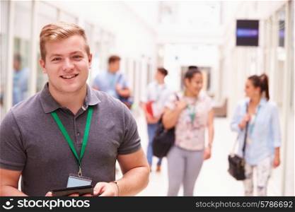 Portrait Of Male College Student In Hallway