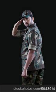 Portrait of male military soldier saluting