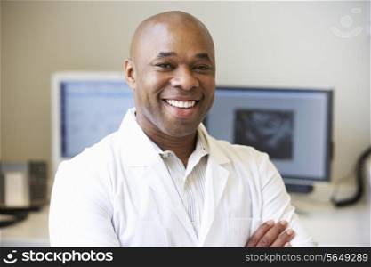 Portrait Of Male Obstetrician In Hospital