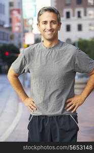 Portrait Of Male Runner On Urban Street