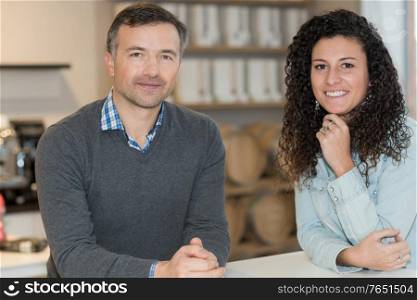Portrait of man and lady in cafe