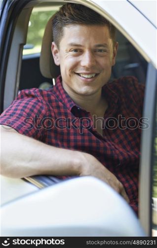 Portrait Of Man Driving Car