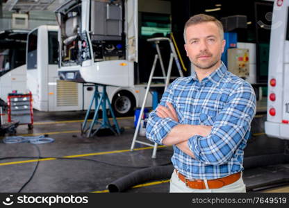 Portrait of man in bus depot