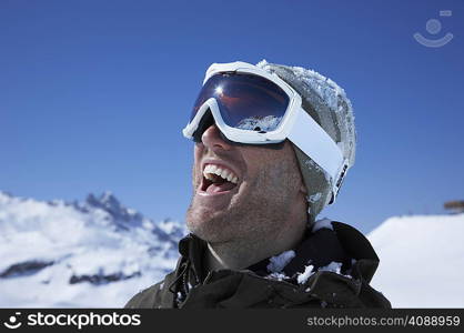 Portrait of man wearing ski goggles