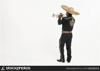 Portrait of Mariachi playing trumpet