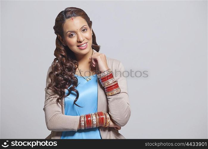 Portrait of married woman with bangles smiling
