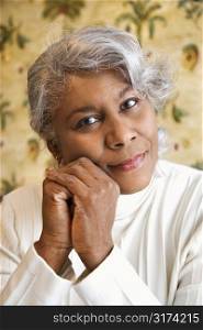 Portrait of mature African American woman looking at viewer.