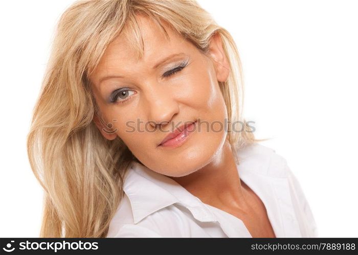 Portrait of mature business woman winking isolated over white background