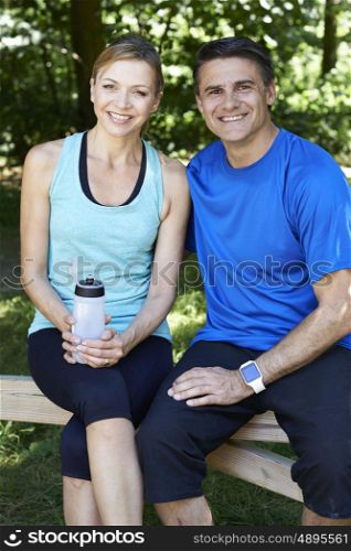 Portrait Of Mature Couple Exercising In Countryside Together