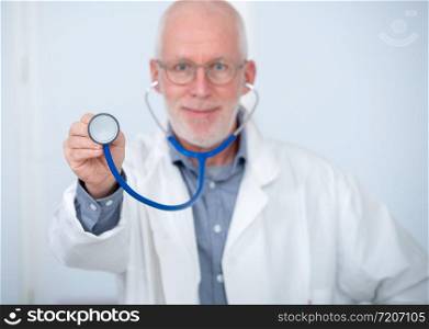 portrait of mature medical doctor with stethoscope