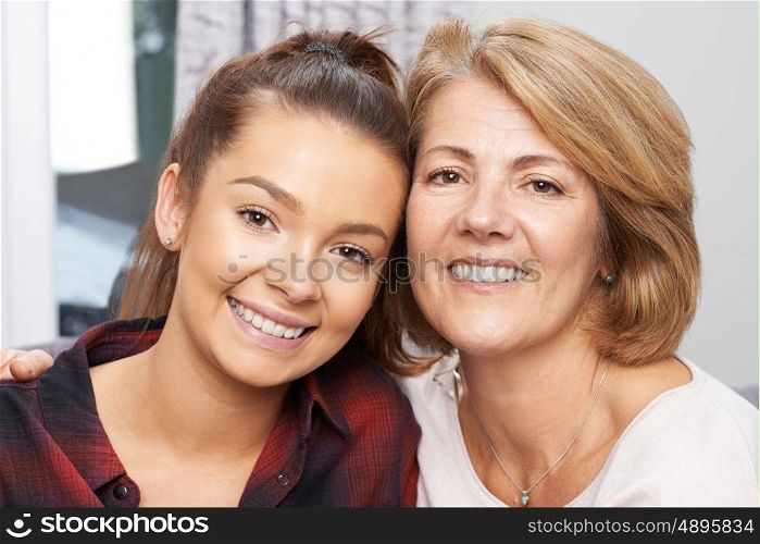 Portrait Of Mature Mother With Teenage Daughter
