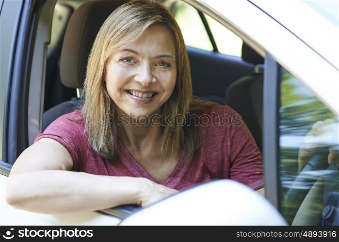 Portrait Of Mature Woman Driving Car