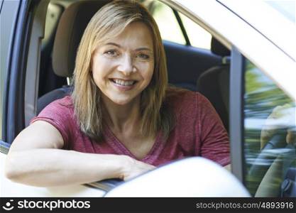 Portrait Of Mature Woman Driving Car