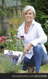 Portrait Of Mature Woman Gardening