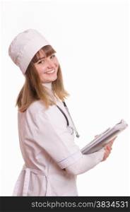 Portrait of medical worker in a white coat, hat, with documents