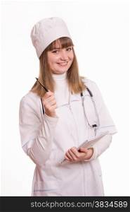 Portrait of medical worker in a white coat, hat, with documents and pen