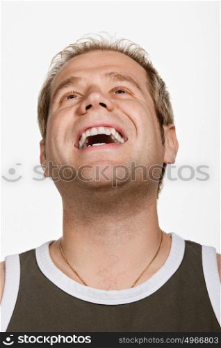 Portrait of mid adult Caucasian man laughing