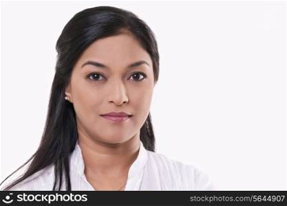 Portrait of mid adult woman over white background