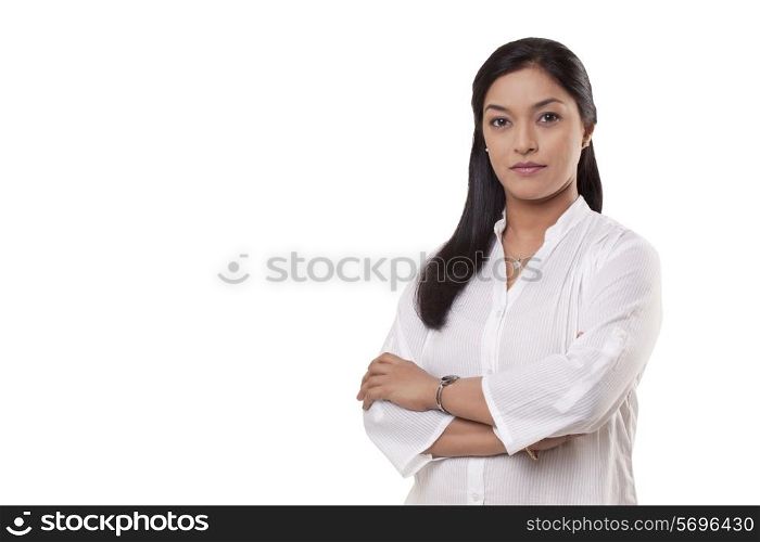 Portrait of mid adult woman with arms crossed