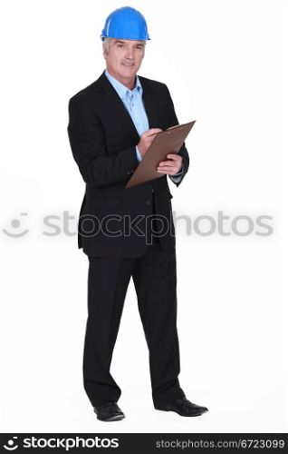 portrait of middle-aged architect holding clipboard