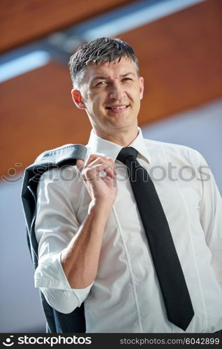 portrait of middle aged business man at modern office space indoors