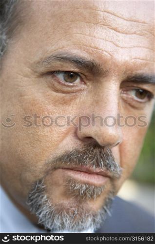 Portrait Of Middle Aged Man Looking Serious
