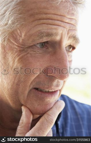 Portrait Of Middle Aged Man Looking Worried