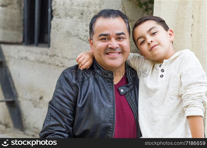 Portrait of Mixed Race Hispanic and Caucasian Son and Father. Portrait of Mixed Race Hispanic and Caucasian Son and Father.