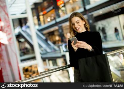 Portrait of modern woman in shopping mall