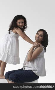 Portrait of mother and daughter