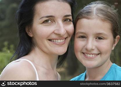 Portrait of mother and daughter, close-up