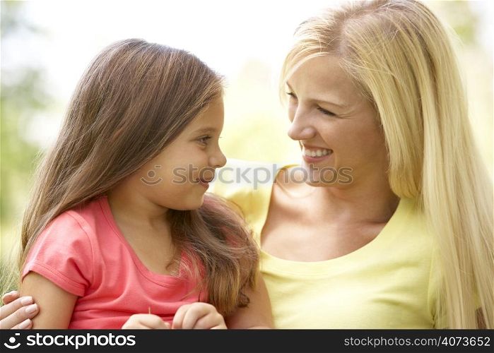 Portrait Of Mother And Daughter In Park