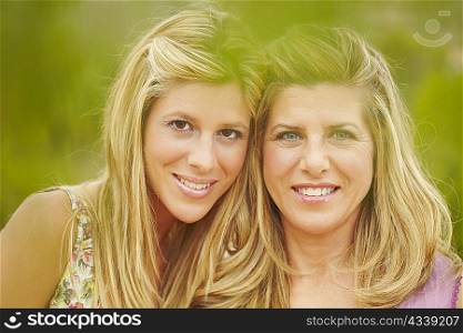 Portrait of mother and grown-up daughter