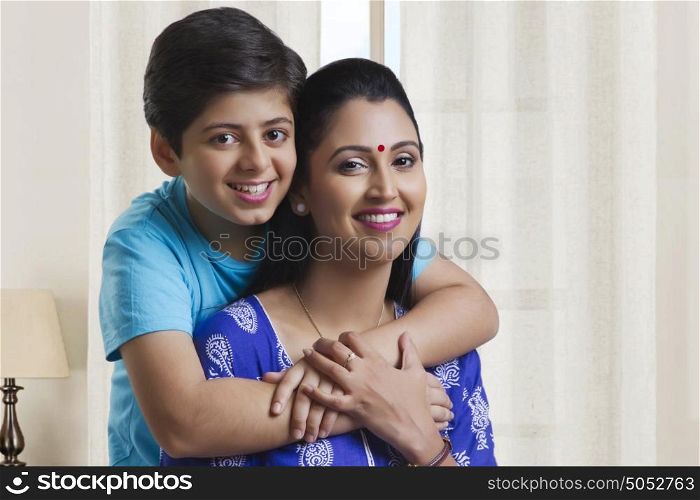 Portrait of mother and son smiling