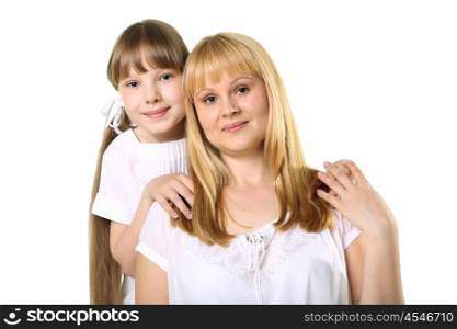 portrait of mother together with daughter in studio