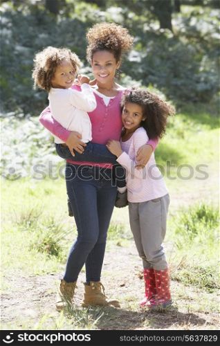 Portrait Of Mother With Daughters In Countryside